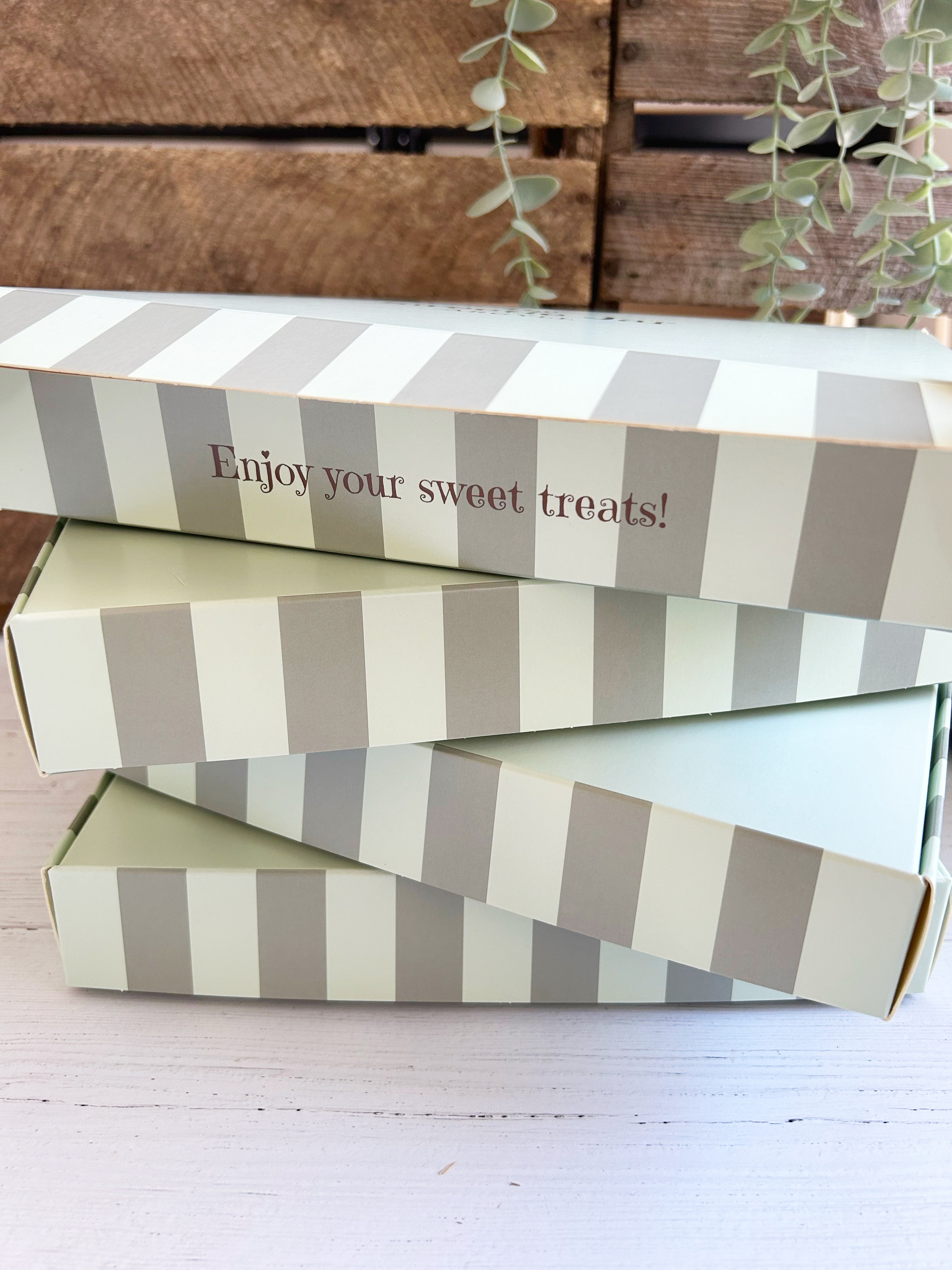 Stack of branded The Sweetie Jar pick 'n' mix boxes